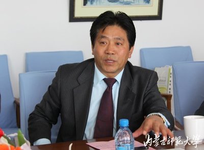 新加坡国立教育学院院长李盛光一行访问我校